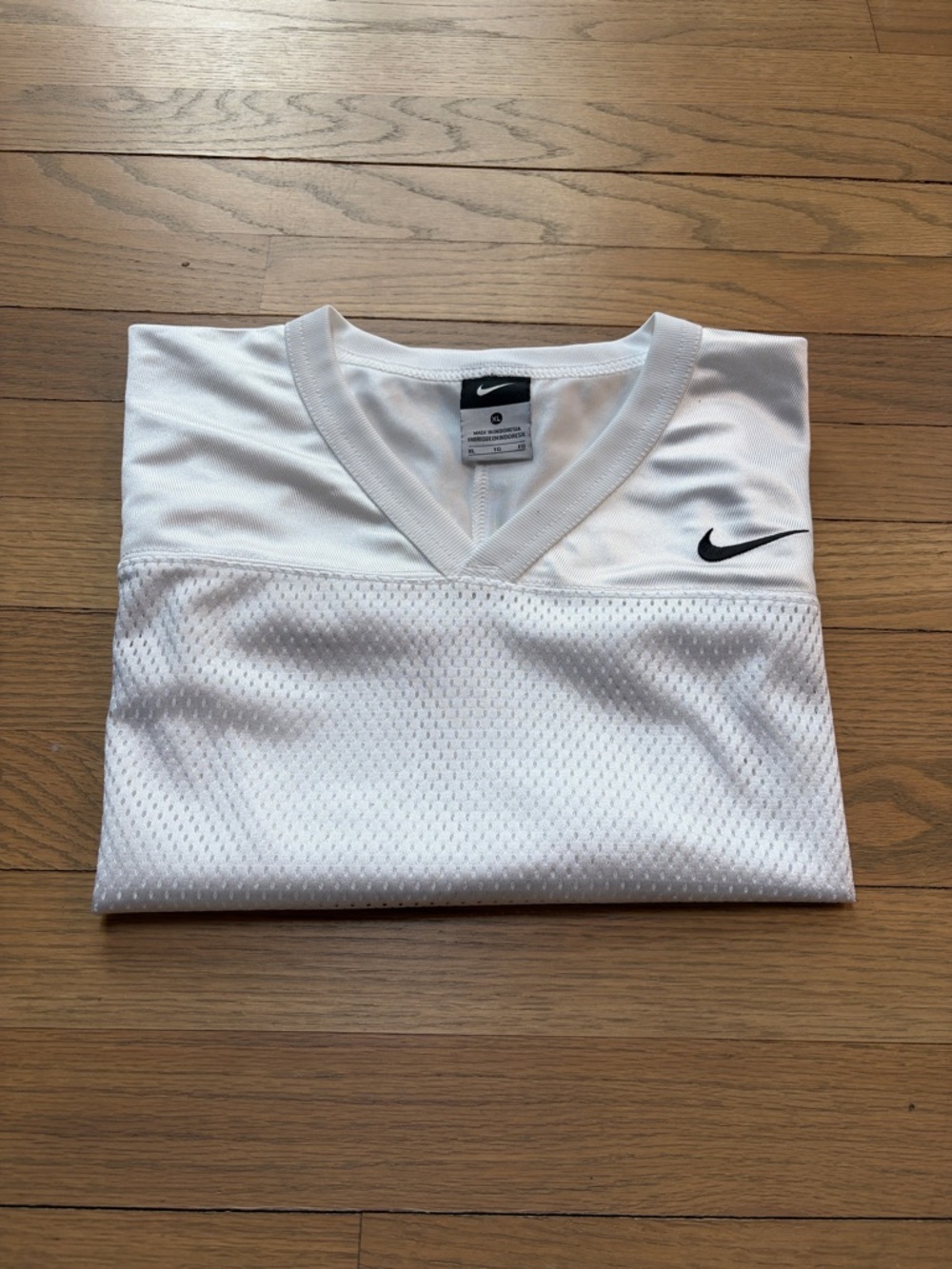 Nike White Men's V-Neck Mesh Jersey with Black Swoosh